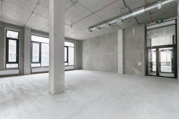 empty pure commercial office building undecorated in gray colors.open space office