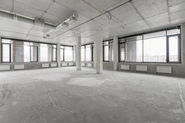 empty pure commercial office building undecorated in gray colors.open space office