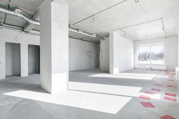 empty pure commercial office building undecorated in gray colors.open space office