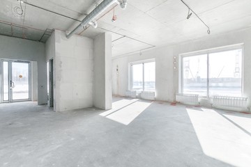 empty pure commercial office building undecorated in gray colors.open space office