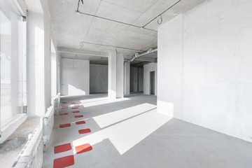 empty pure commercial office building undecorated in gray colors.open space office