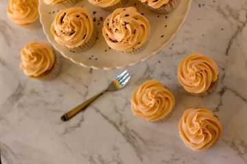 Vanilla cupcakes on display set ups. Moist and delicious.