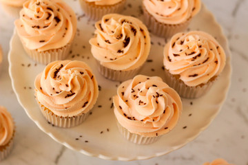 Vanilla cupcakes on display set ups. Moist and delicious.