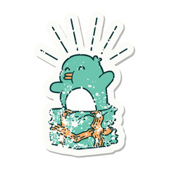 Fototapeta premium grunge sticker of tattoo style penguin sitting on present