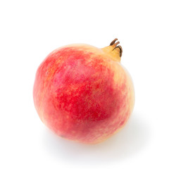 Orange-Red Pomegranate fruit still raw, isolated on a white background.