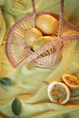 Passion fruit still life on a background of green tablecloths. Concept of freshness, organic, diet, garden, tea