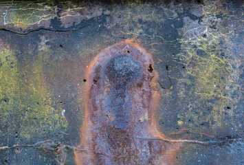 Rusty colorful rock sea wall