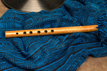 indigenous wooden flute of the peoples of Latin America, called quena
