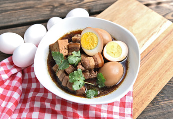 Thai Stewed Pork & Eggs with Five Spices (Thai name is Kai Pa Lo)..Famous Thai egg menu.