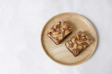 Fototapeta na wymiar Homemade cake toffee and chocolate, cashews nut with caramel on top 
