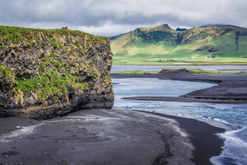 Aerial view from Dyrholaey cape with black sands of Kirkjufjara beach in Iceland