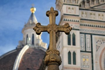 symbols of christianity god in front of Florance duomo, The mistery sculpture on Famous white Architectural cathedral church under blue sky at Florance, travel destination backgrounds