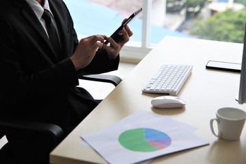 Work from home concept close up hand using mobile phone VPN to office business avoid Covid-19 Coronavirus