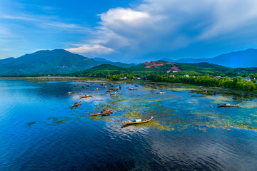 Aerial view of boats on Cau Hai lagoon in Tam Giang lagoon, Hue, Vietnam.