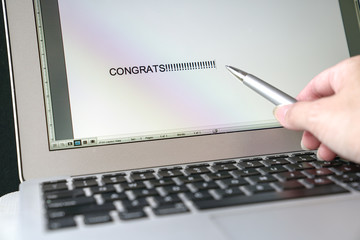 Obraz na płótnie Canvas Congrats, typed words on the computer screen