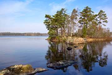 View of a small island, situated in a lake,