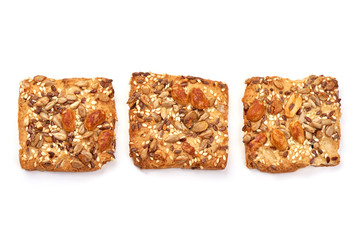 Cookies with nuts and seeds, isolated on white background