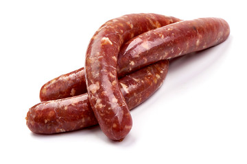 Fresh raw beef sausages, isolated on white background