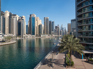 Plakat DUBAI, UAE - February 2020: Modern buildings in Dubai Marina, Dubai, UAE. In the city of artificial channel length of 3 kilometers along the Persian Gulf, taken on February 2020 in Dubai.