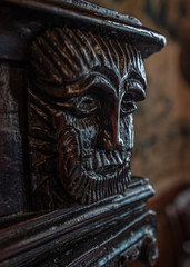 Church interior face wood carving