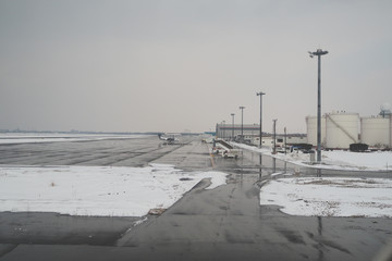 The runway was covered in snow, resulting in flights that canceled because of failing to fly up and...