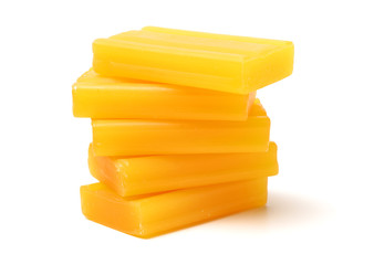 Yellow soap isolated on white background 