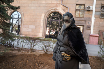 plague doctor in an empty city