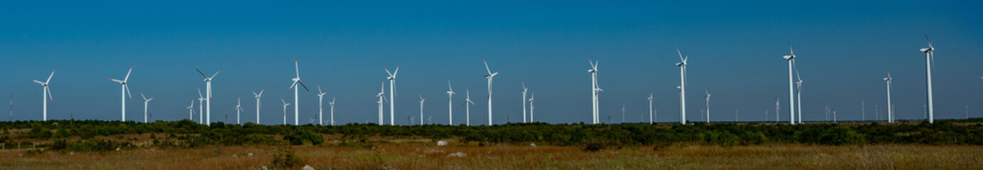 windmills on the plain in the middle of the day