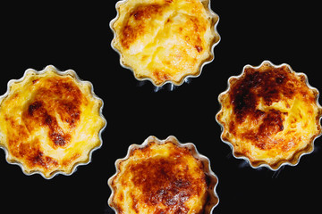 homemade casseroles, cupcakes shaped, black background