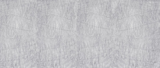 Crumpled silver gray soft leather wide texture. Wrinkled supple leather light background