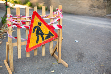 Road repair. Warning signs about repair work of a paving. Attention detour