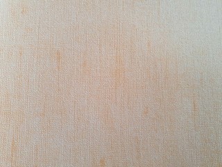 Fototapeta premium The background of the wall has orange, red and rough tones.