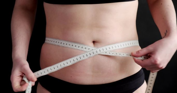 Excess weight woman, obesity problems. Fat female looking at her body, insecurities, examining stretch marks, dieting, needs healthy weight loss diet. Health Problems, Fat, Unhealthy
