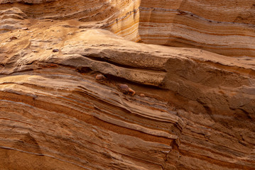 Layers of soil photographed in a sand quarry. Interesting sand formation