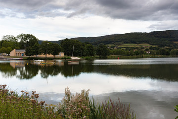 Fototapeta premium View of the Vallon lake in the town of Autun, Burgundy, France