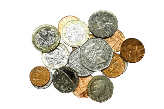 Top view and crop of British currency coins isolate on white background. Make with path.