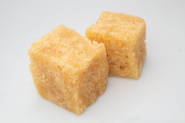 cube synthetic rubber sample on a white background