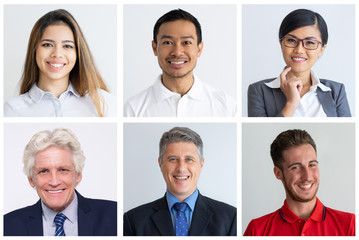 Portraits of smiling co-workers wearing formal clothes except one person. One person wearing bright red T-shirt. Office and business fashion concept. Teamwork concept.