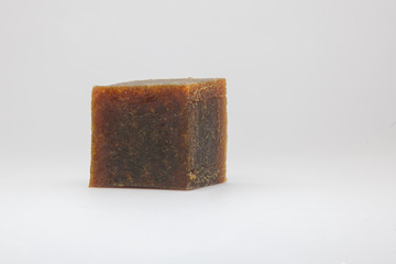 cube synthetic rubber sample on a white background