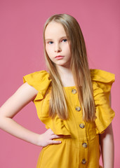 portrait of little model girl in studio