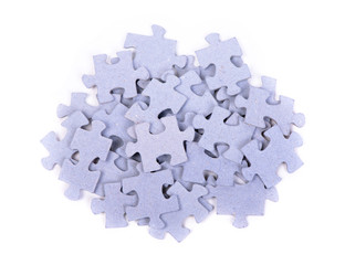 Heap of puzzles pieces