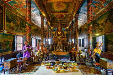 Inside and outside the Wat Phnom temple in Phnom Penh, Cambodia. Beautiful view of center in Phnom Penh, Cambodia
