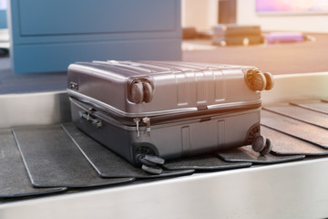 Luggage baggage on conveyor belt in airport, transport business at departure lounge traveler in...