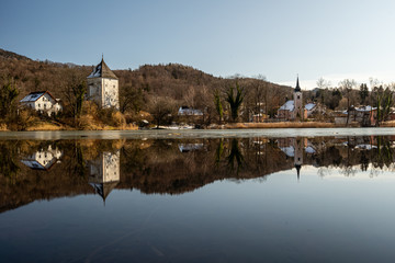 Fototapeta na wymiar A view of the lake and church of Sankt Jakob am Thurn near Salzburg in Austria.