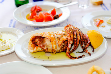 Grilled squid on the table 