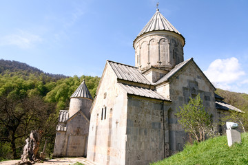 Fototapeta na wymiar Surb Astvatsatsin, Church of Holy Virgin. Ancient Armenian monastery Haghartsin in Tavush region in wooded valley of Ijevan ridge. Armenia