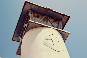 Low Angle View Of Old Lighthouse Against Clear Sky