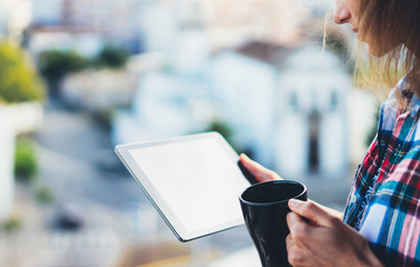 Girl using tablet gadget device and drink coffee, social distance concept, girl person holding computer on background sun city, online wifi  internet technology, mockup templates gadget