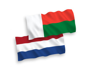 Flags of Madagascar and Netherlands on a white background