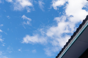 roof of the house and Cloudy sky